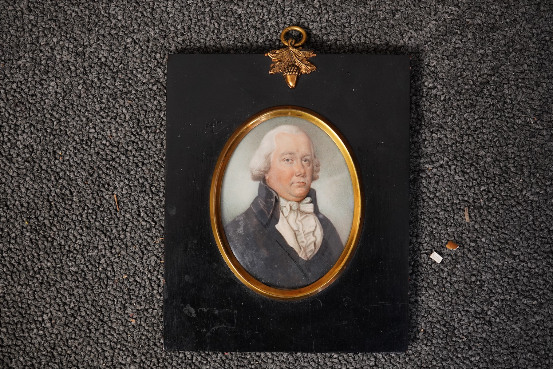 Thomas Hazlehurst (English, 1740-1821), Miniature portrait of a gentleman wearing a powdered wig, black coat and white stock, watercolour on ivory, 8.5 x 6.5cm. CITES submission reference YXCNGZD8